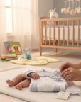 Stork And Baby white 100% cotton long sleeve baby set with blue gingham trim and boat embroidery.