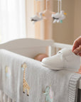 Stork And Baby white leather baby boy shoe with velcro closure, perfect for everyday wear.