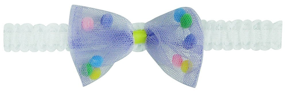 Headband with a colorful polka dot bow on a white background