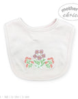 White bib with floral embroidery on a white background, featuring 'Mother's Choice' branding.
