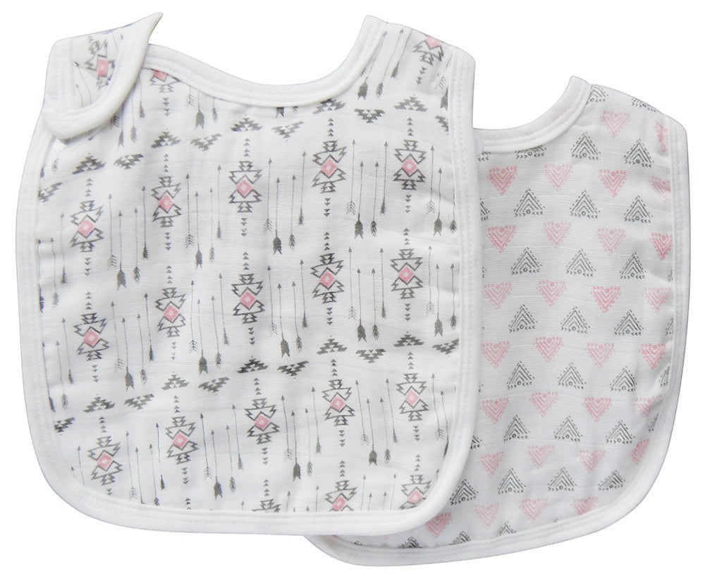 Two baby bibs with geometric patterns on a white background