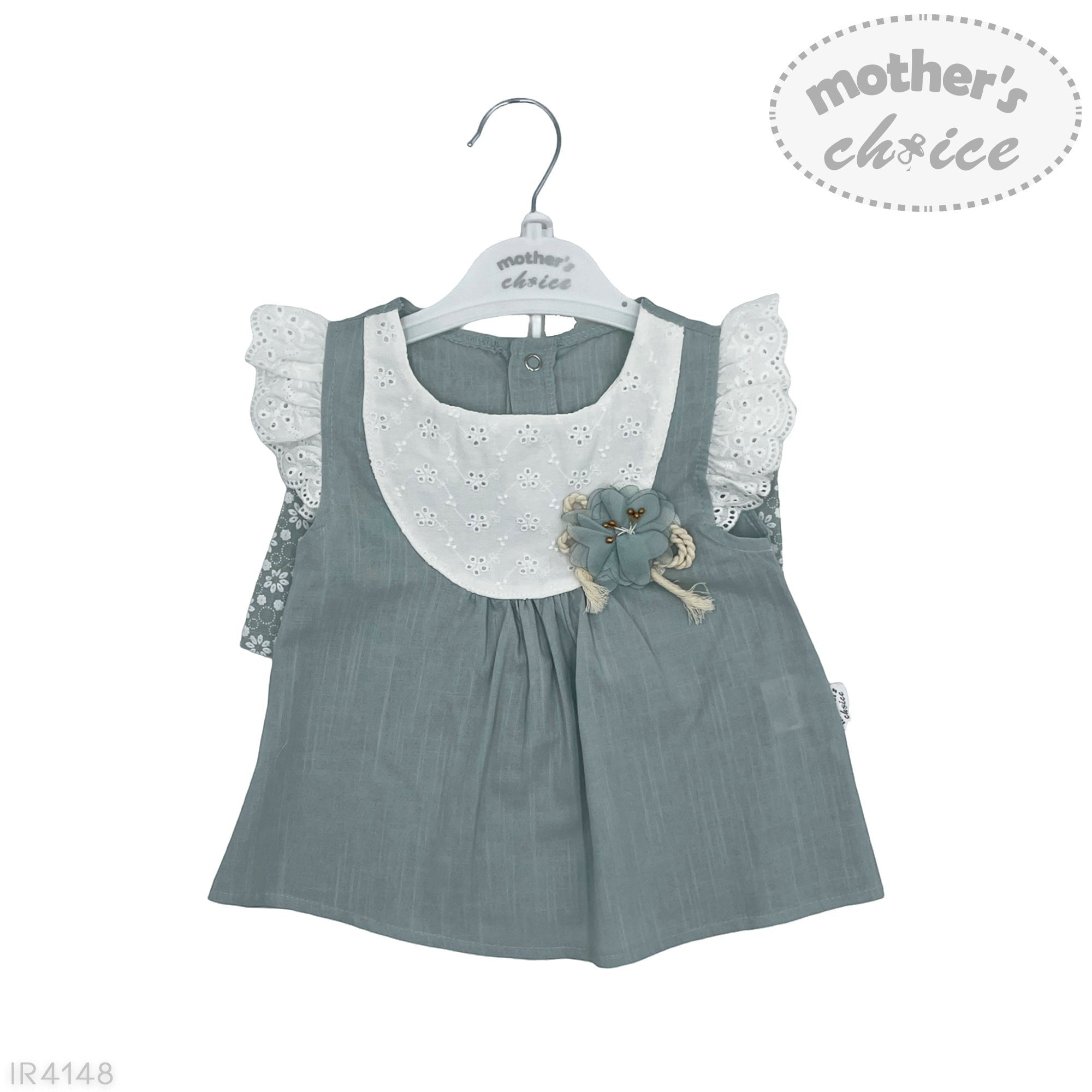 Children's dress with floral details on a hanger, branded 'mother's choice'.