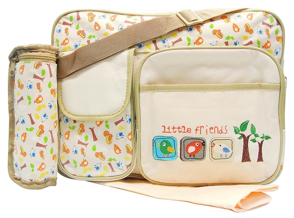Stork And Baby beige diaper bag with a playful 'Little Friends' bird and tree print, featuring multiple pockets and a matching bottle holder