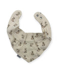 Beige baby bib with animal pattern on a white background