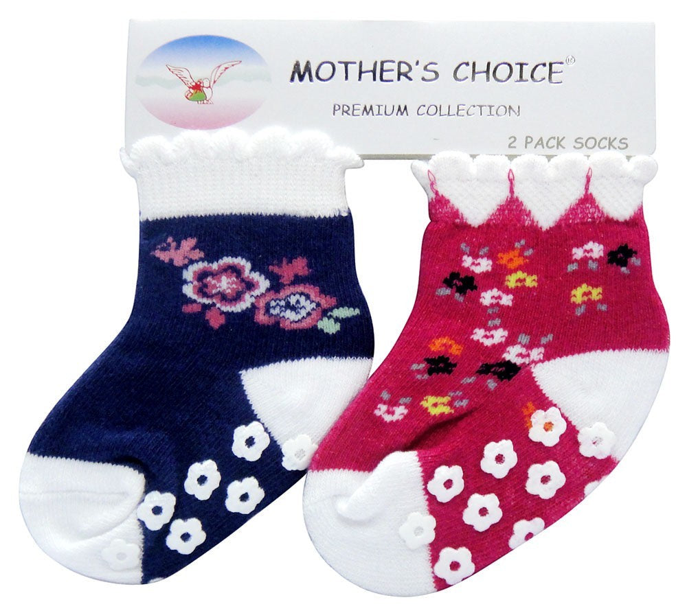 Two pairs of baby socks with floral patterns in packaging labeled 'Mother's Choice'.