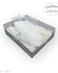Gift set with baby items in a clear box labeled 'Mother's Choice' on a white background