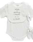 Baby outfit with text 'When I grow up, I want to be a baby' on a white background
