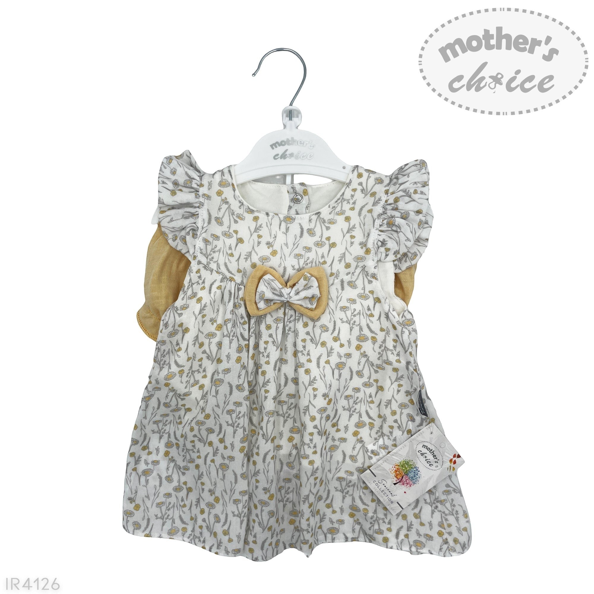 Baby dress with floral pattern and bow tie on a hanger, branded 'Mother's Choice'.