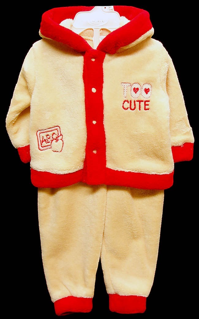 Children's fleece outfit with red trim and 'Too Cute' text on a black background