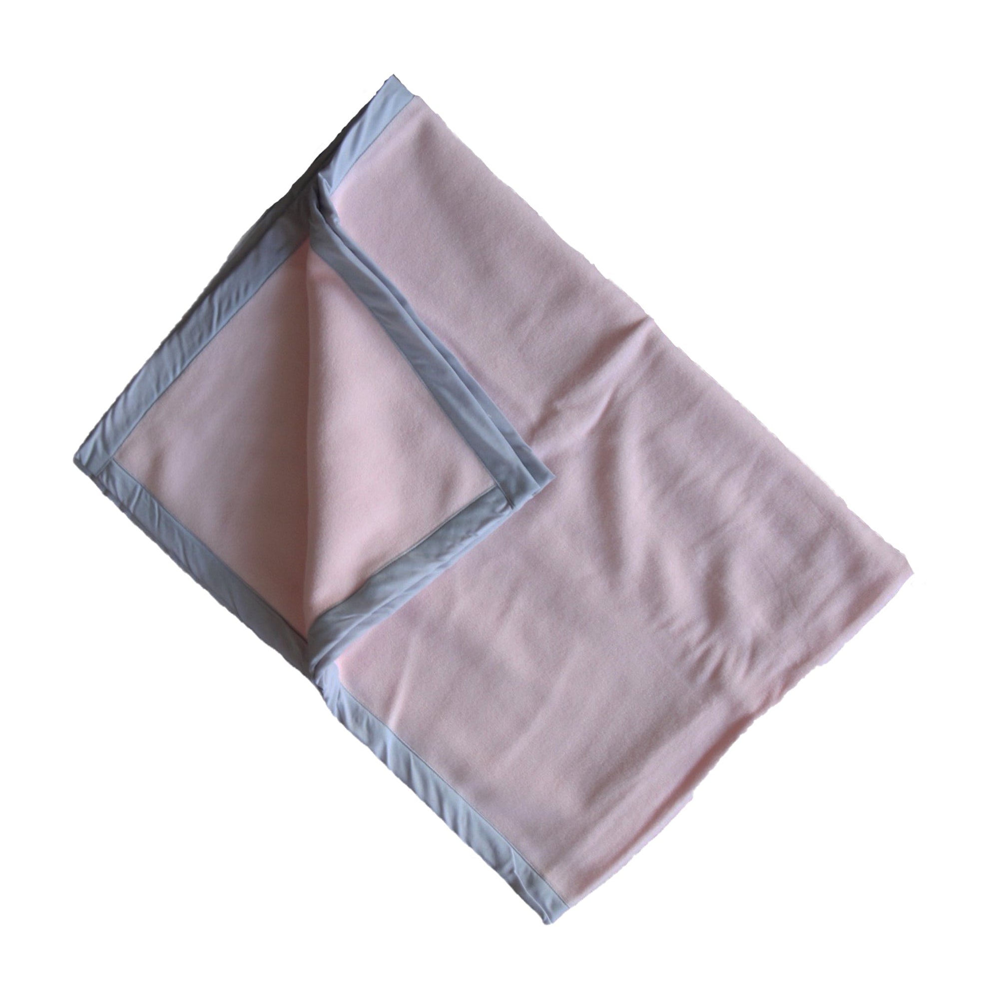Pink blanket with gray trim on a white background