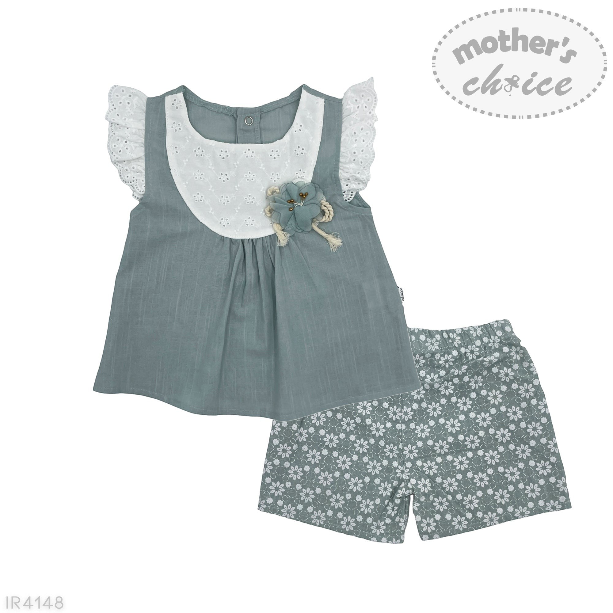 Children's outfit with top and shorts featuring floral patterns on a white background.