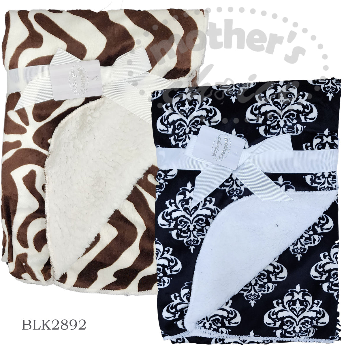 Two baby blankets with zebra and damask patterns, tied with white ribbons on a white background.