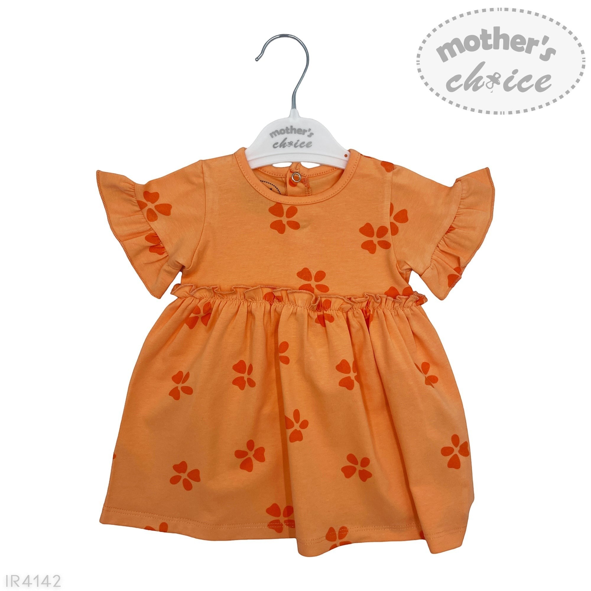 Orange dress with floral patterns on a hanger against a white background