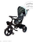 Black and gray baby tricycle with canopy on a white background, featuring 'Mother's Choice' branding.