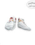 Pair of baby socks with floral cuffs on a white background, featuring 'Mother's Choice' branding.