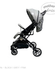 Black and gray stroller with 'Mother's Choice' branding on a white background