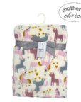 Flannel blanket with unicorn pattern and 'Mother's Choice' tag on a white background