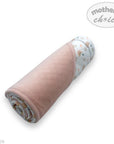 Roll of pink fabric with a patterned end, branded 'Mother's Choice', on a white background.