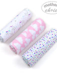 Three rolls of patterned fabric with 'mother's choice' branding on a white background