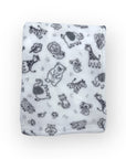White blanket with black animal prints on a white background