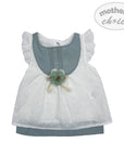 Baby dress with floral details on a white background, branded 'Mother's Choice'.