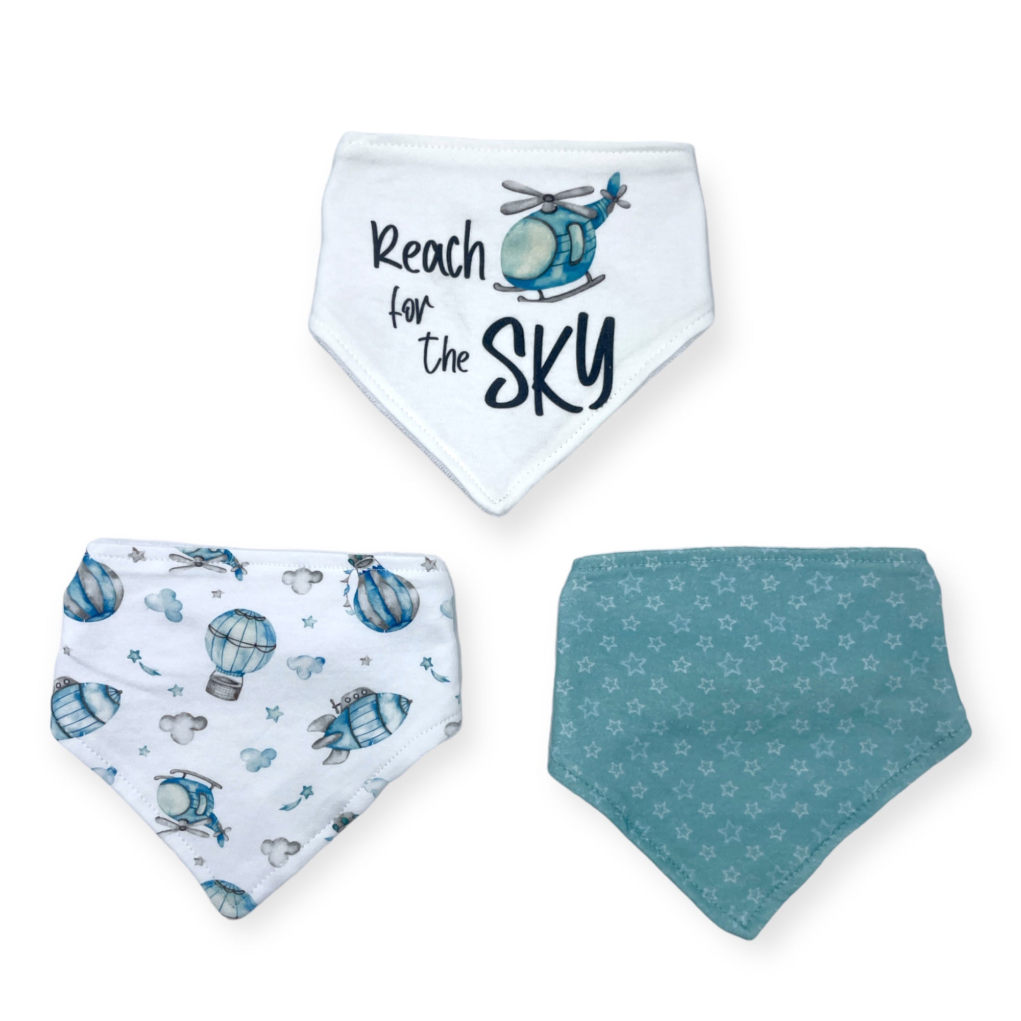 Three baby bibs with aviation-themed designs on a white background