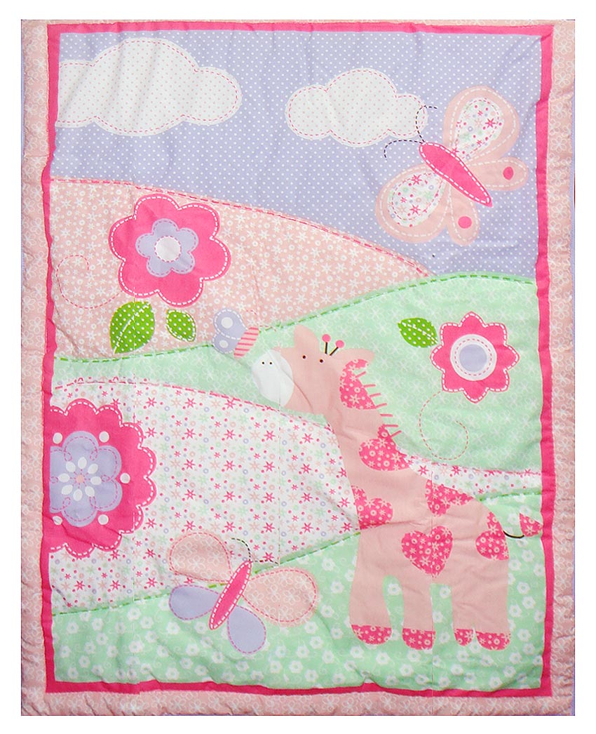 Children's quilt with pink elephant, flowers, and butterflies on a pastel background
