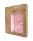 Packaged bamboo jersey wraps with pink design on a white background