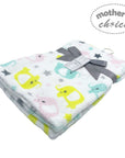 Baby blanket with cartoon animal design and 'Mother's Choice' label on a white background