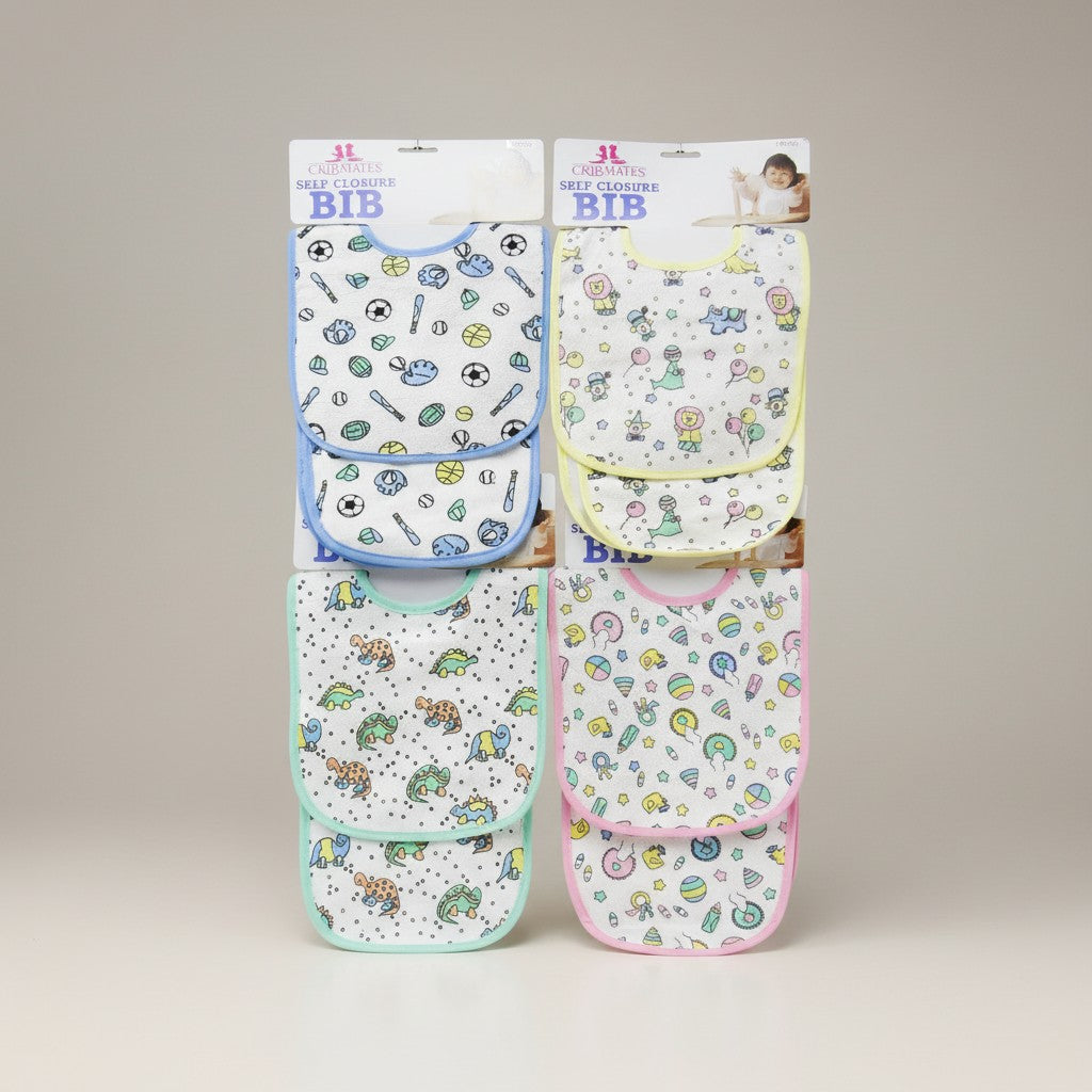 Set of baby bibs with various patterns on a beige background