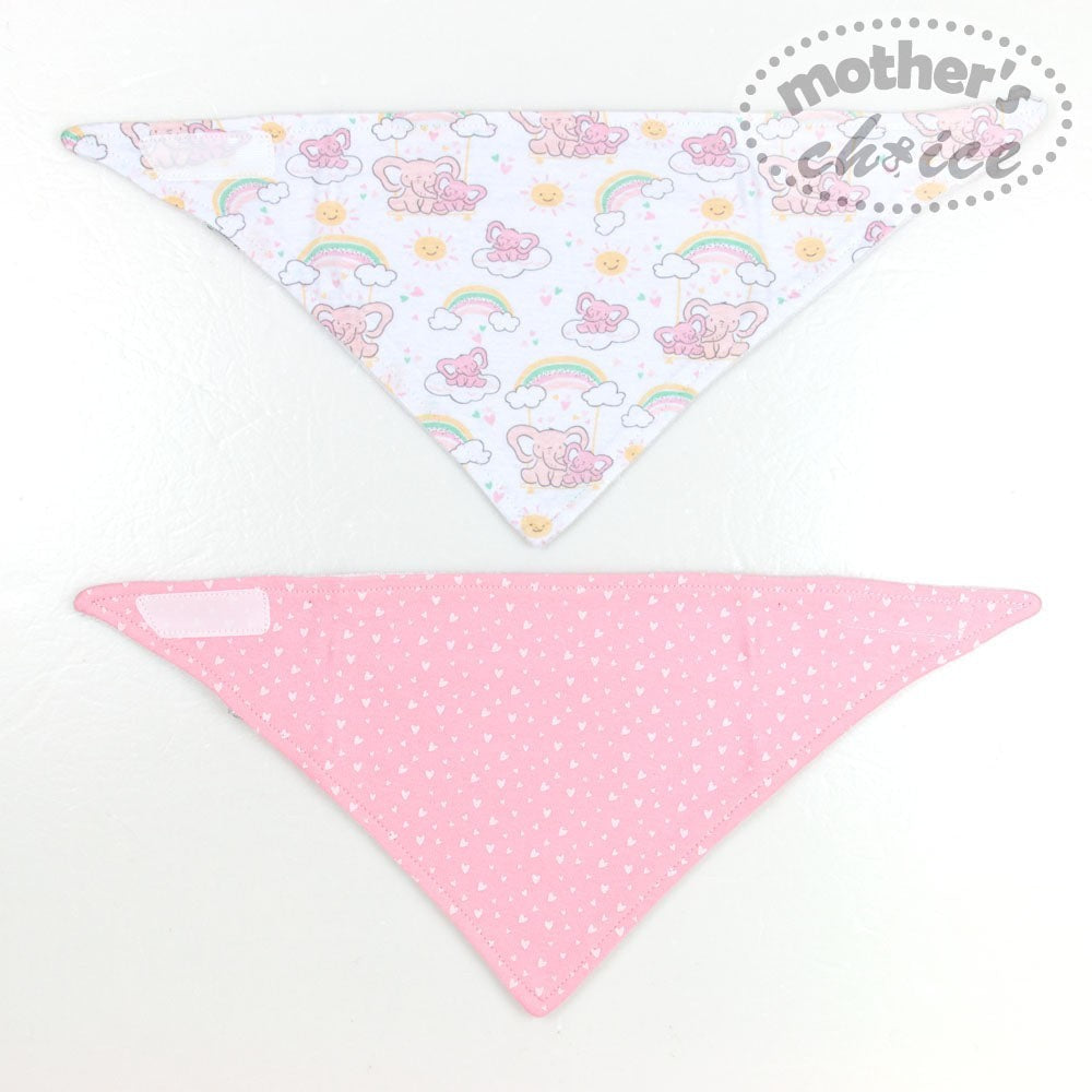 Two baby bibs with different patterns on a white background, one featuring cartoon characters and rainbows, the other pink with white polka dots.