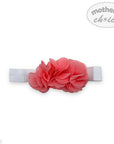 Floral headband with coral flowers on a white background, branded 'Mother's Choice'.