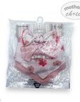 Packaged baby outfit with floral design on a white background