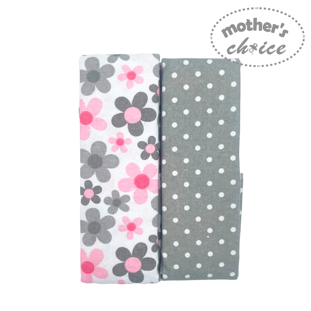 Two fabric swatches with floral and polka dot patterns on a white background, branded 'mother's choice'.