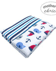 Folded fabric with nautical patterns on a white background, featuring 'mother's choice' branding.