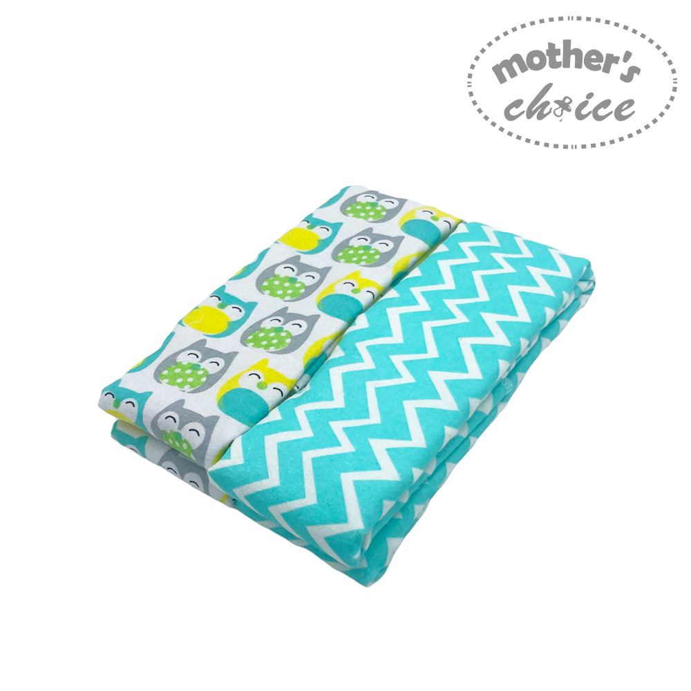 Two baby blankets with owl pattern and chevron pattern on a white background, branded 'Mother's Choice'.