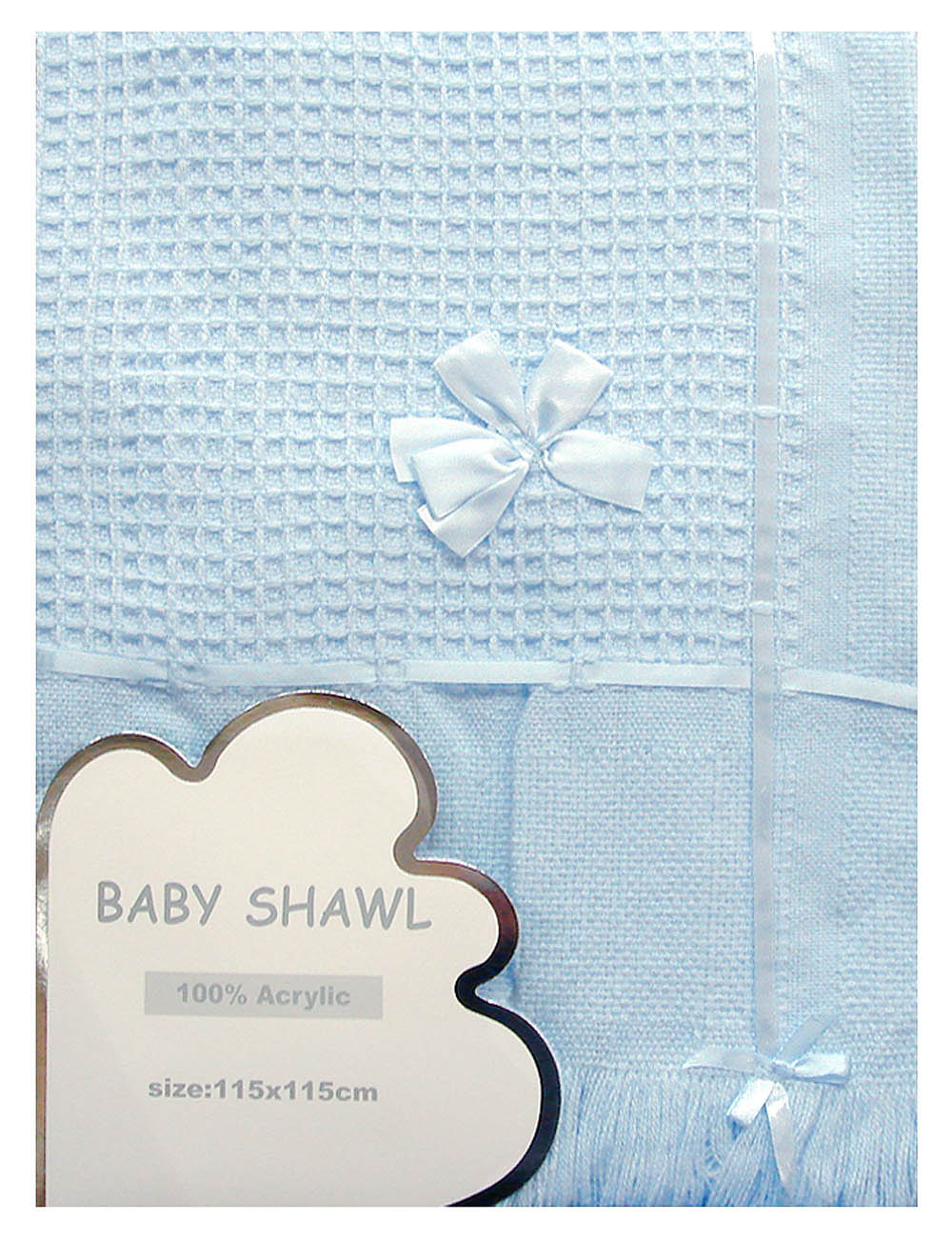Blue baby shawl with a white bow and label on a white background