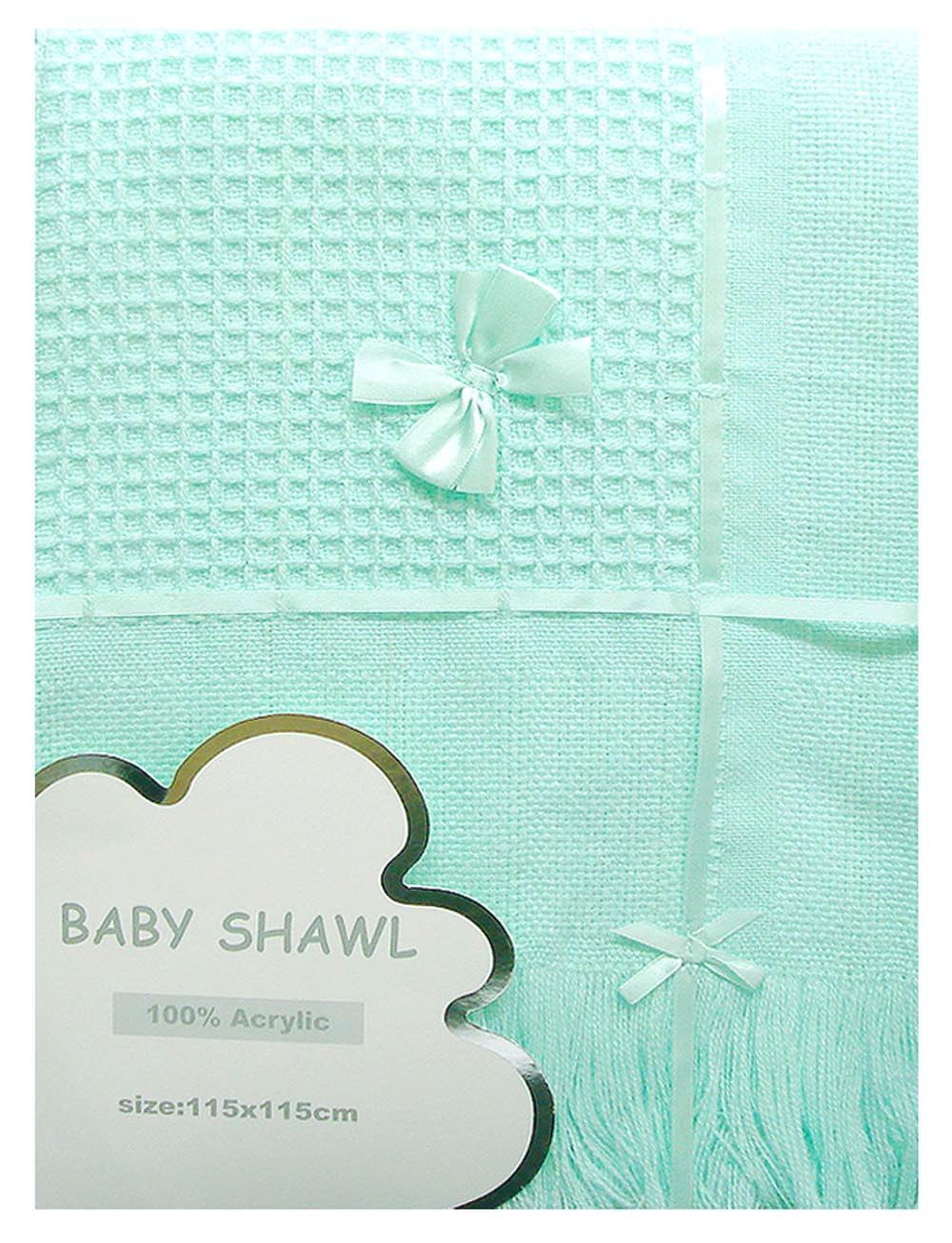 Mint green baby shawl with a bow on a light blue background