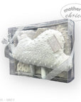 White textured pillow with 'baby' embroidery in a clear packaging box on a white background.