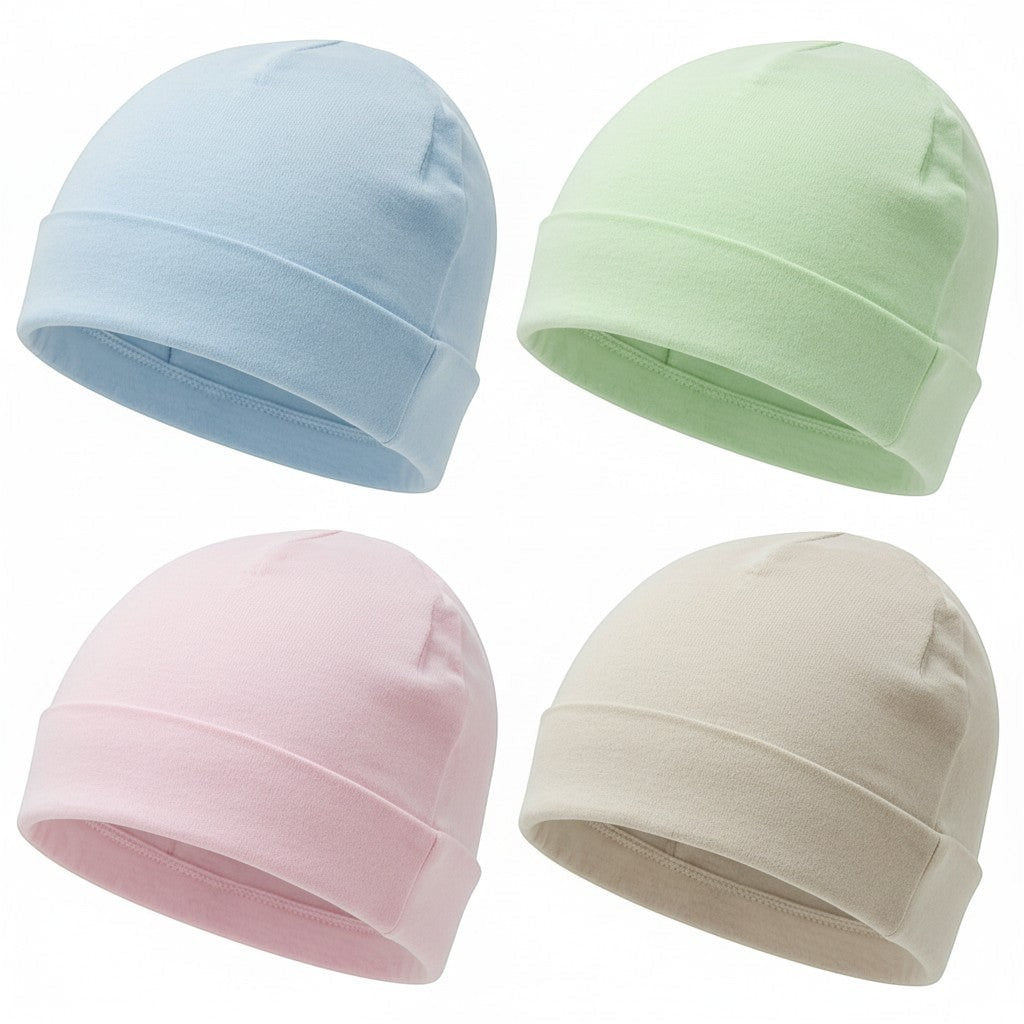 Four baby hats in blue, green, pink, and beige on a white background