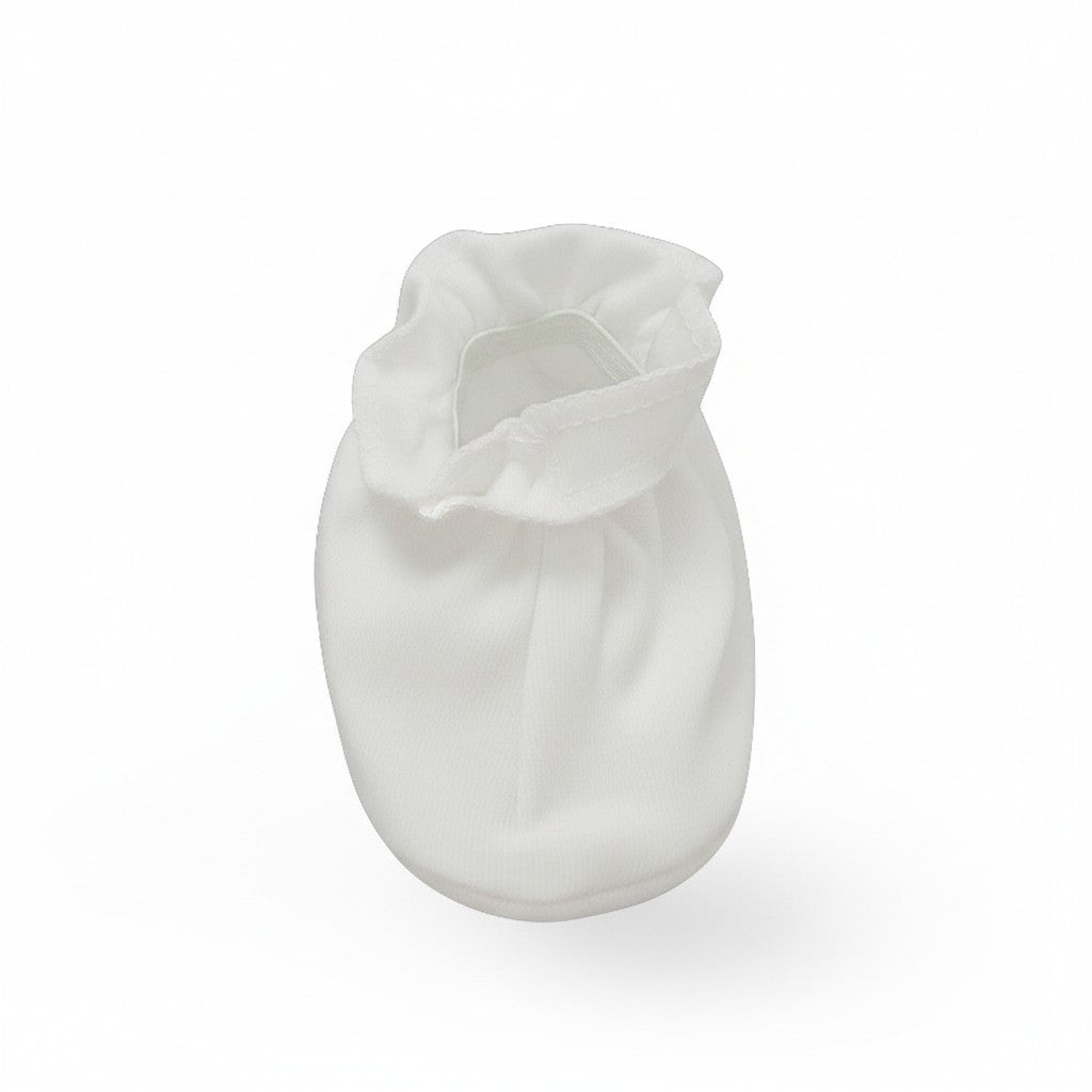 White baby outfit on a white background