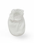 White baby outfit on a white background