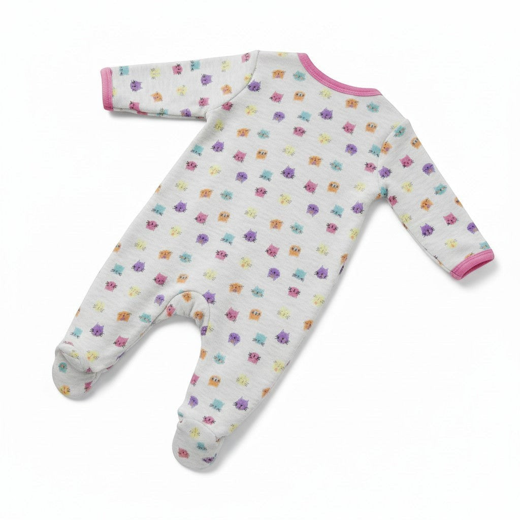 Baby onesie with colorful patterns on a white background