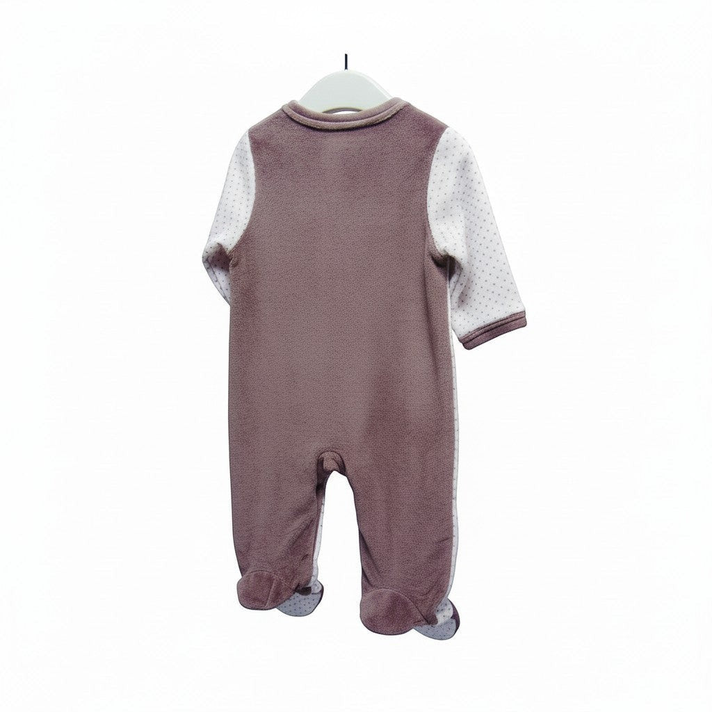 Baby onesie with patterned sleeves on a white background