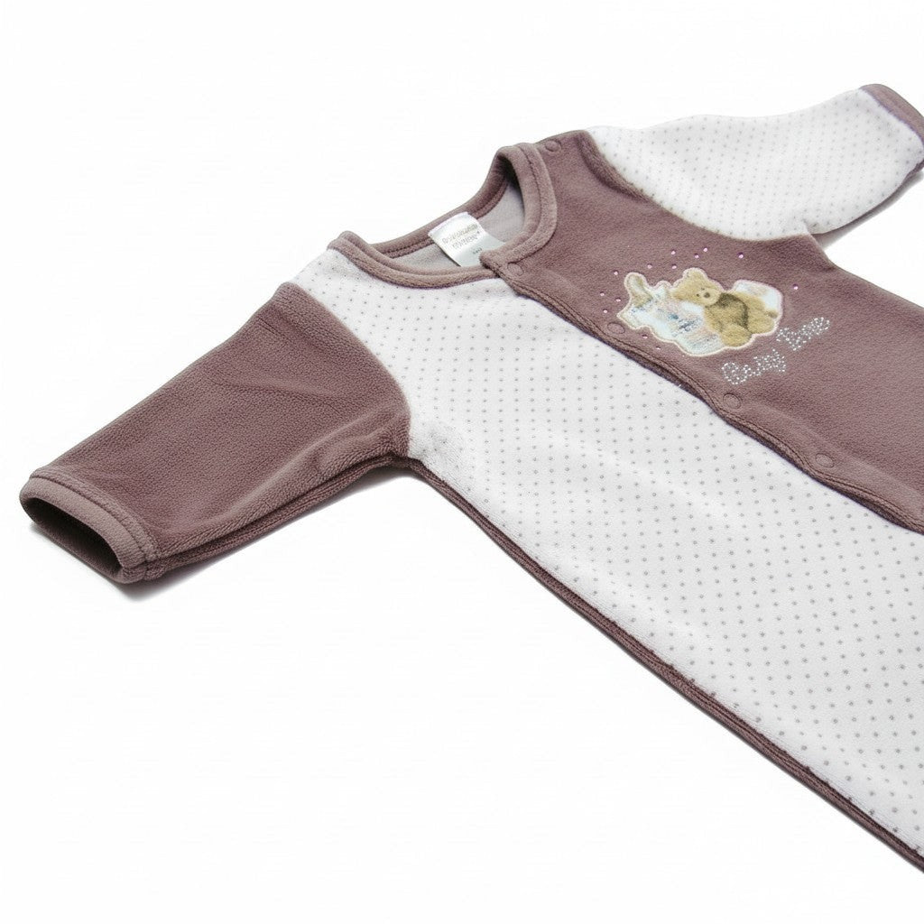 Baby onesie with a cartoon design on a white background