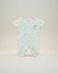 Baby onesie with floral pattern on a light background