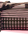 Duffel bag with pink anchor pattern and matching pouch on a white background