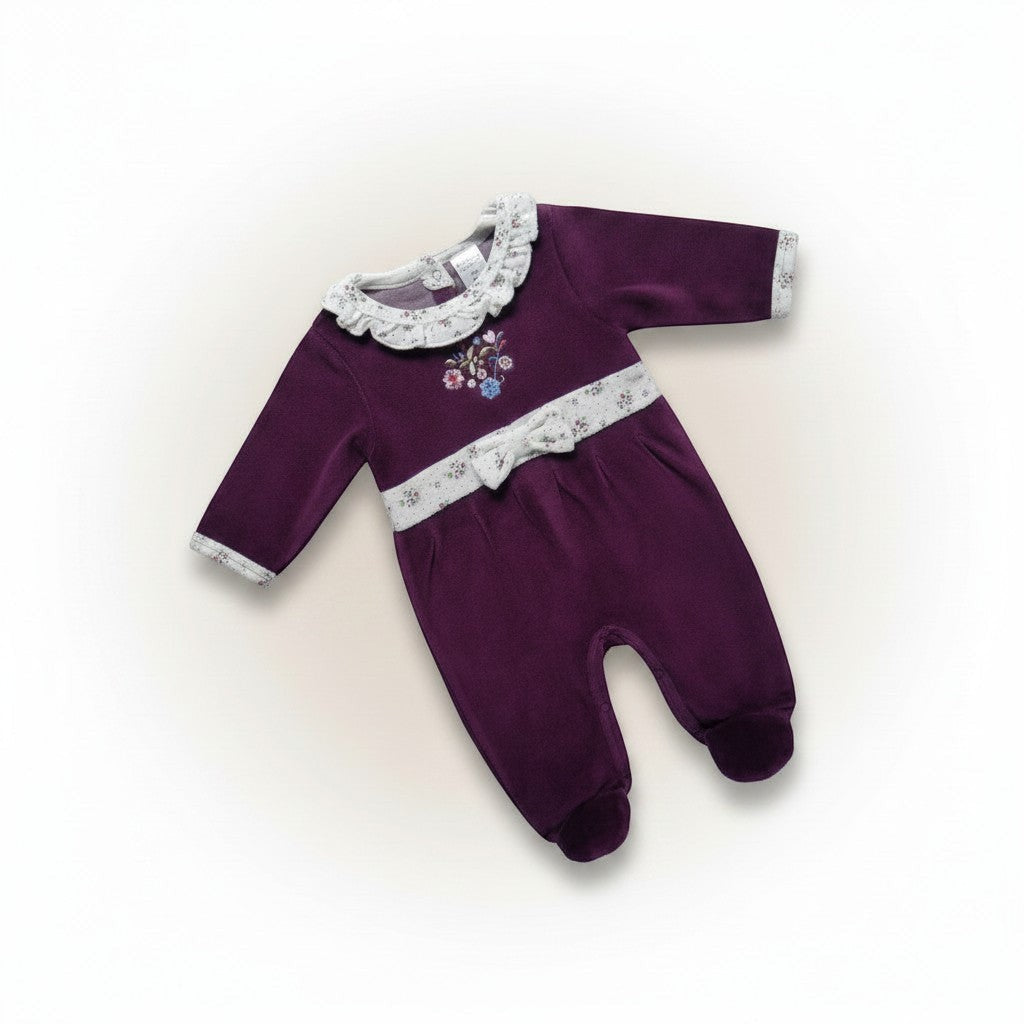Purple baby romper with floral embroidery on a white background