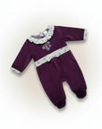 Purple baby romper with floral embroidery on a white background