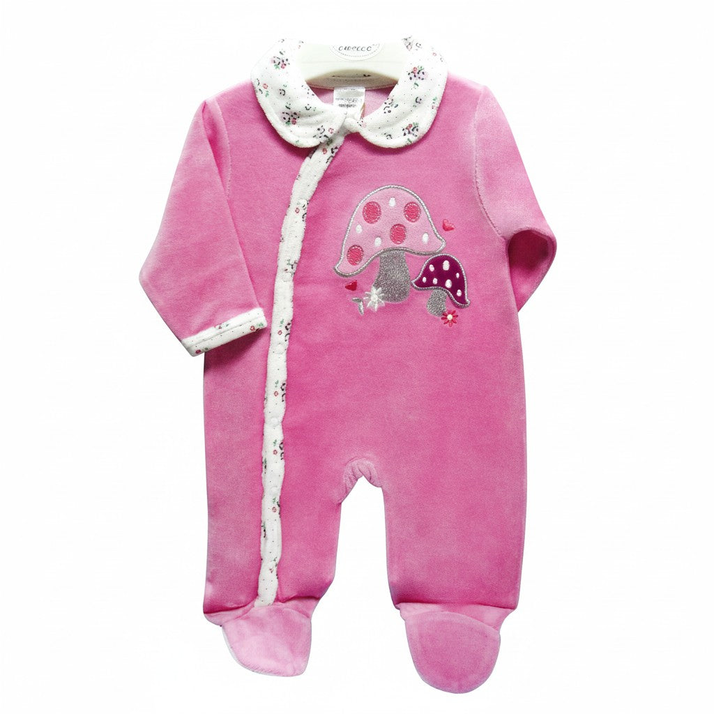 Pink baby onesie with mushroom design on a white background